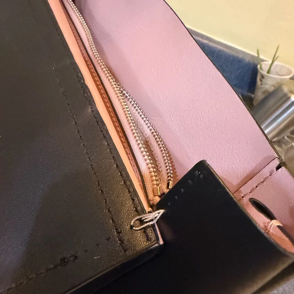 kate spade black leather flap backpack